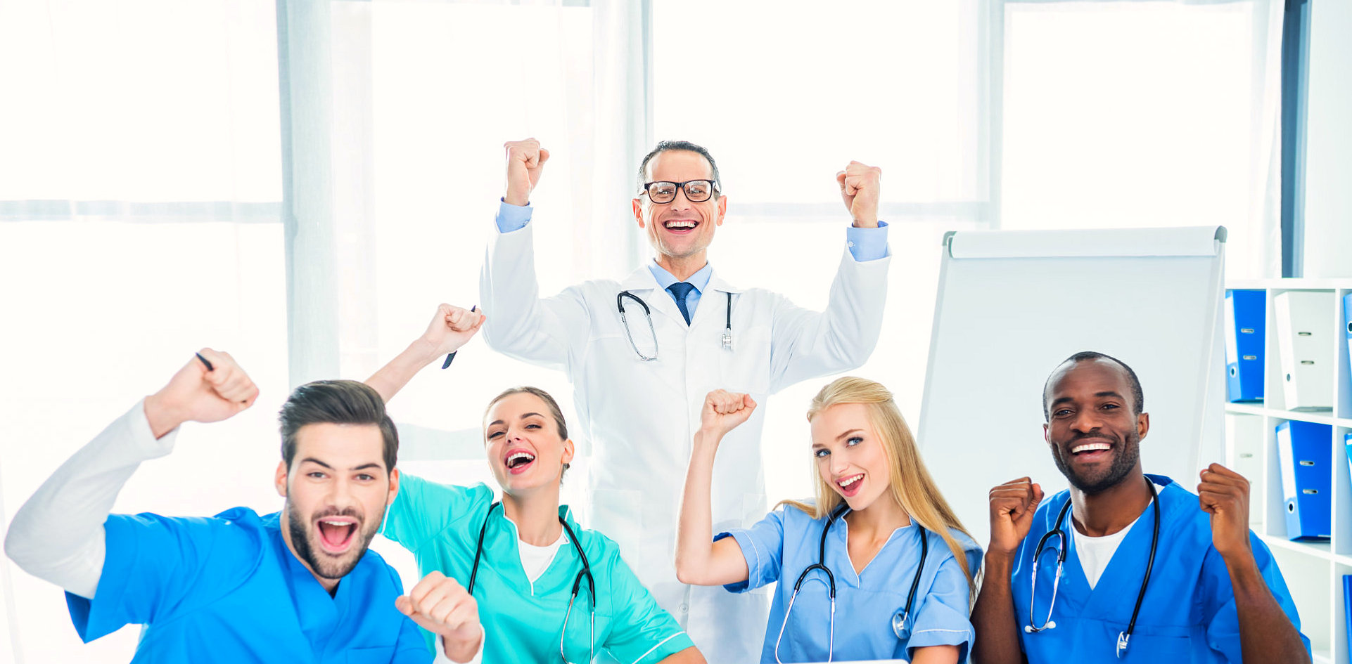 group of doctors cheering